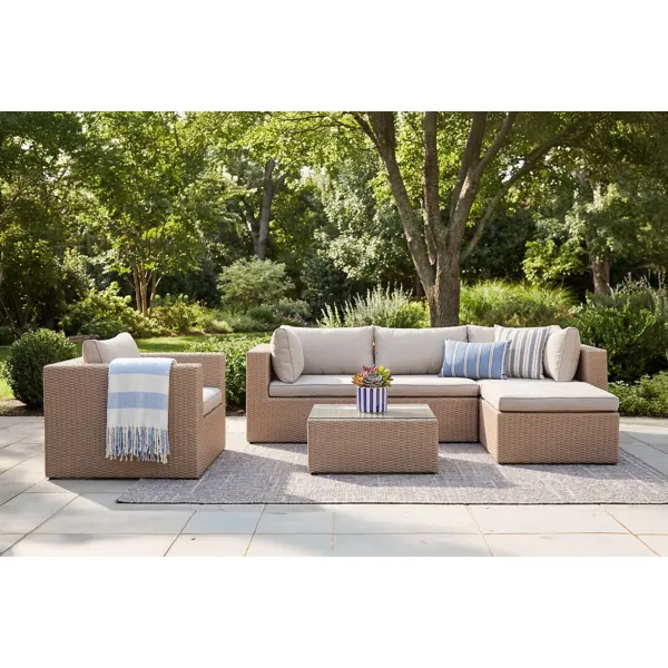 Como mittmodul i naturfarget flett med beige puter